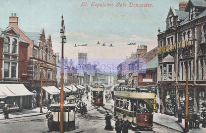 Vintage postcard of a street scene with trams and buildings in Doncaster, featuring sepulchre gate.