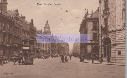 Vintage black and white photograph of a street scene in East Parade, Leeds with tram and pedestrians.