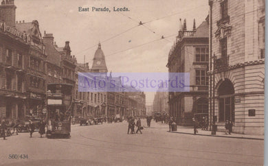 Vintage black and white photograph of a street scene in East Parade, Leeds with tram and pedestrians.