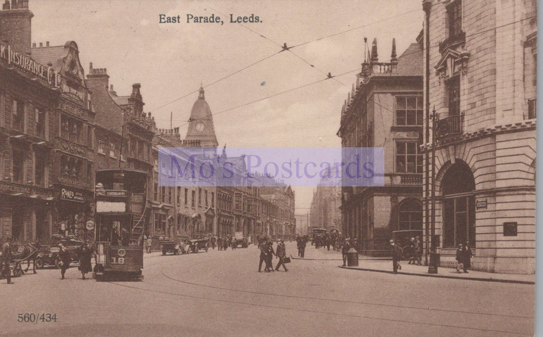 Vintage black and white photograph of a street scene in East Parade, Leeds with tram and pedestrians.