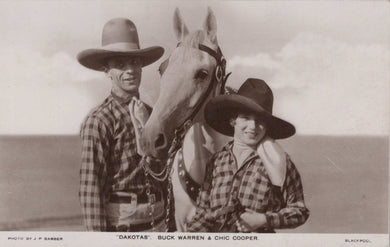 Two people in cowboy hats with a horse, with text indicating 'Dakotas Buck Warren & Chic Cooper'.