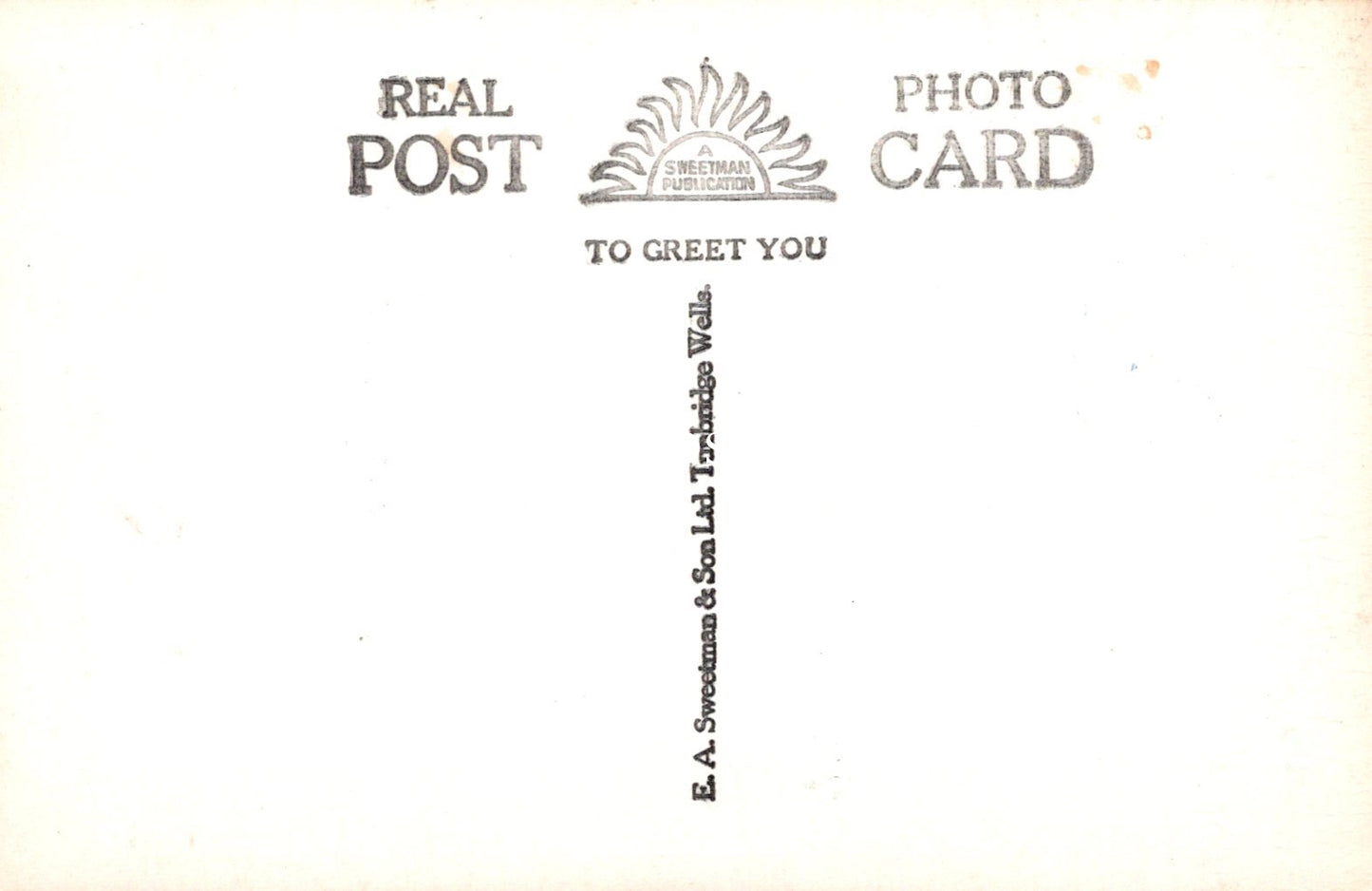 Vintage-style 'Real Post Photo Card' with text and logo on a white background