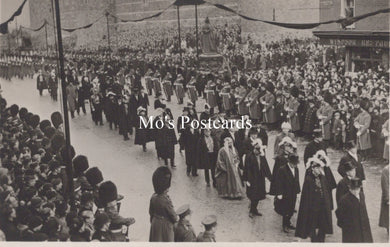 Vintage black and white postcard of a large crowd gathered for an event 