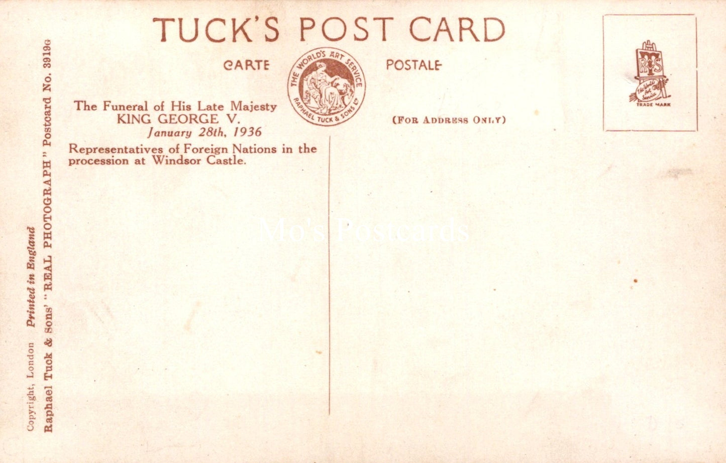 Vintage Tuck's Post Card with text and stamps on a beige background