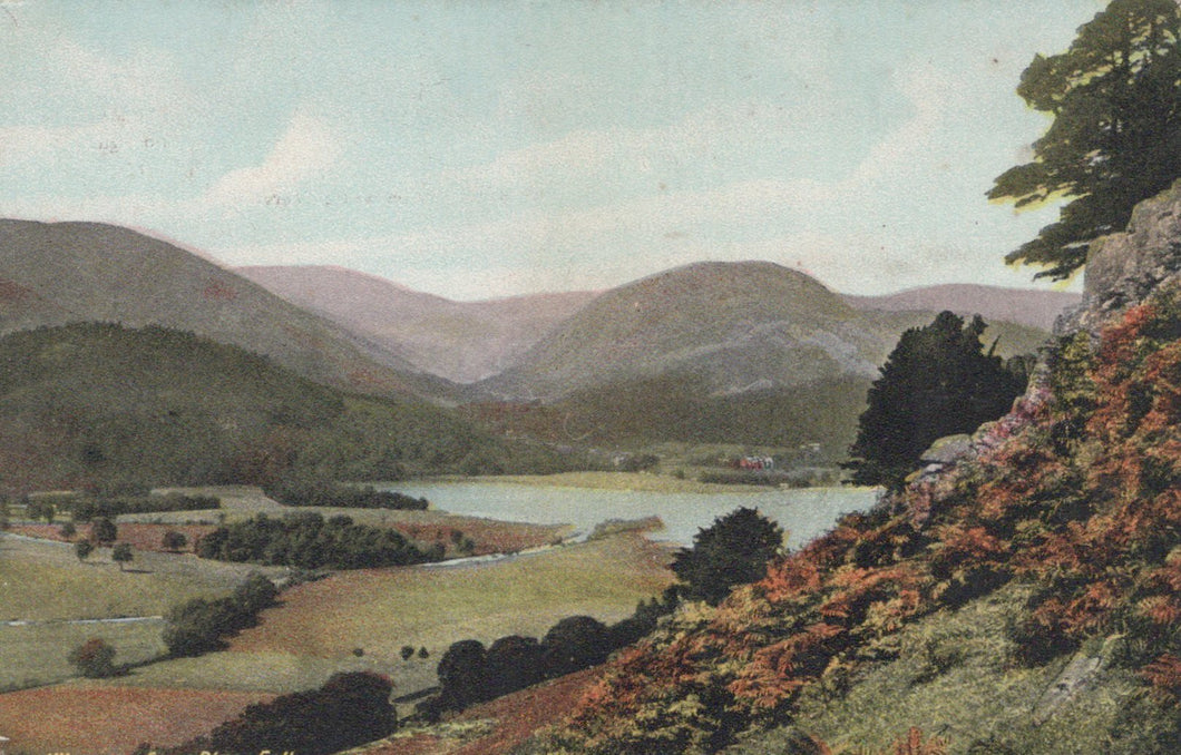 Landscape with a lake and mountains in the background