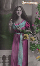 Load image into Gallery viewer, Woman in a vintage-style dress holding flowers and a butterfly, with decorative elements.
