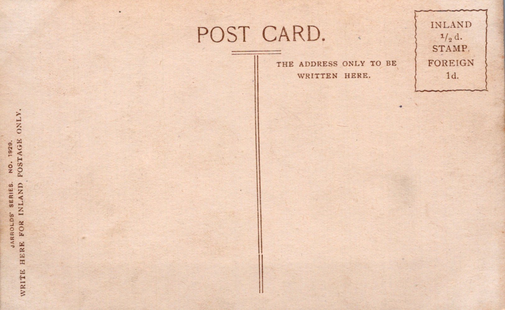 Back of a vintage postcard with text and stamp information.