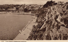 Load image into Gallery viewer, Vintage photograph of a coastal scene with a promenade and cliff gardens.
