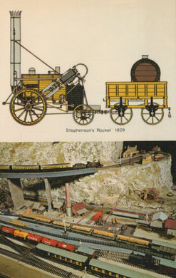 Model of Stephenson's Rocket from 1829 and a detailed model train layout.