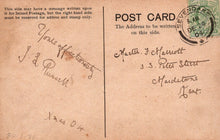 Load image into Gallery viewer, Vintage postcard with handwritten text and a stamp, featuring a brown background.
