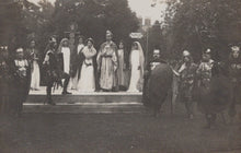 Load image into Gallery viewer, Stage performance with actors in formal attire outdoors
