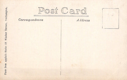 Vintage postcard back with 'Post Card Correspondence Address' text and a small rectangular area for writing.