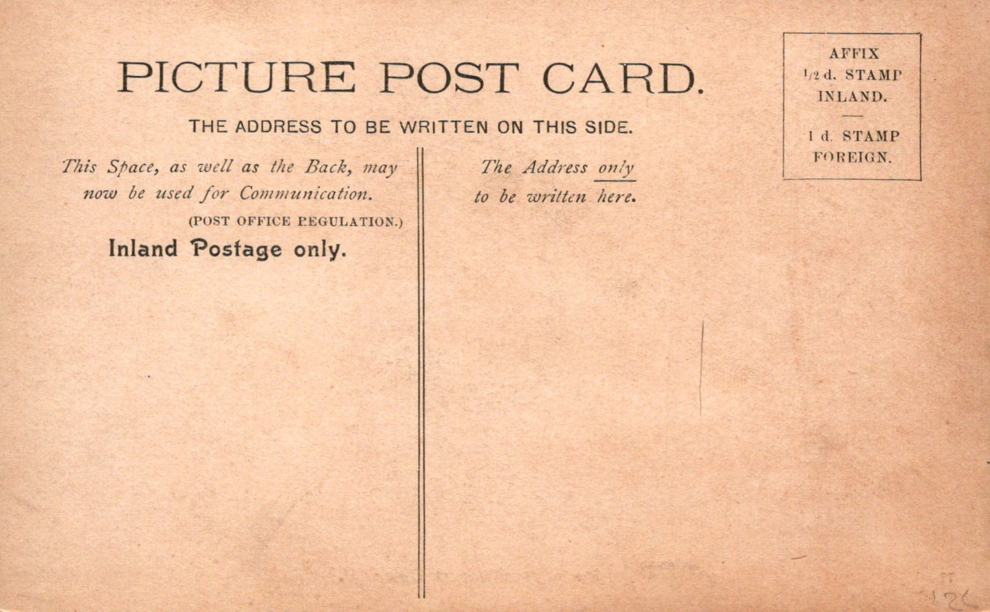 Vintage picture postcard with text and stamps on a brown background