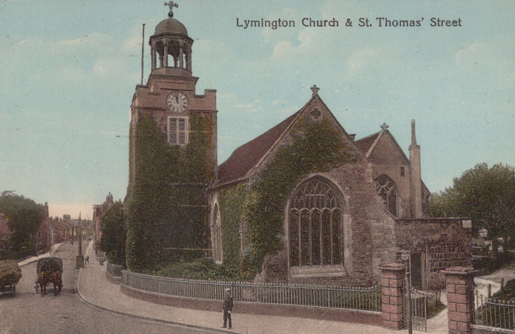 Vintage postcard of Lymington Church and St. Thomas' Street with a clock tower.