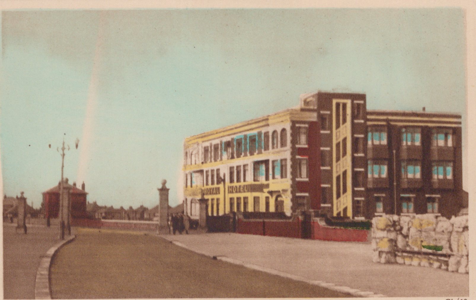 Historical photograph of a building with a pastel color palette