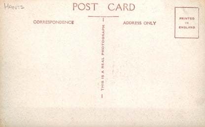 Back of a postcard with text about correspondence and photography, printed in England.