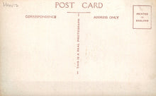 Load image into Gallery viewer, Back of a postcard with text about correspondence and photography, printed in England.
