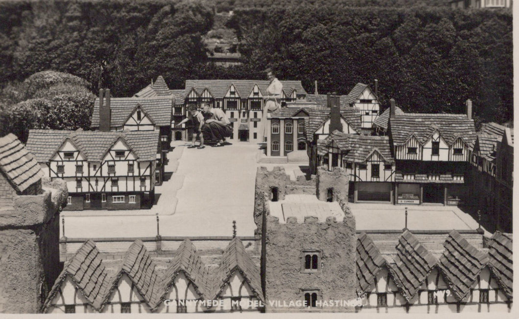 Model of a village with tudor-style houses and a central square.