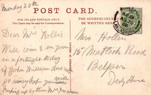 Load image into Gallery viewer, Vintage postcard with handwritten text and a stamp, featuring a red border and green stamp.
