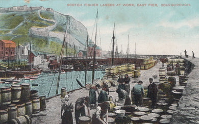 Vintage postcard of Scottish fishermen at work on East Pier, Scarborough