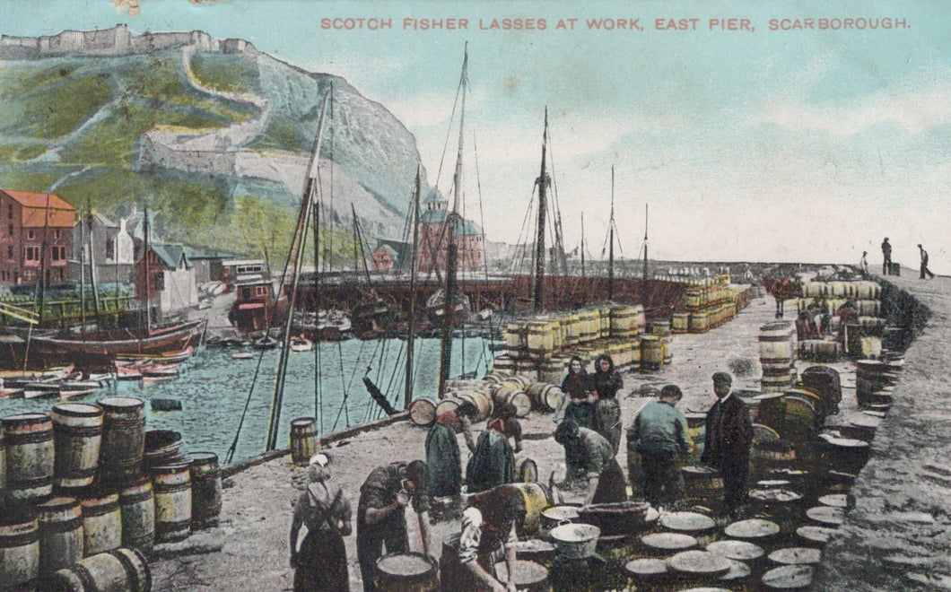 Vintage postcard of Scottish fishermen at work on East Pier, Scarborough