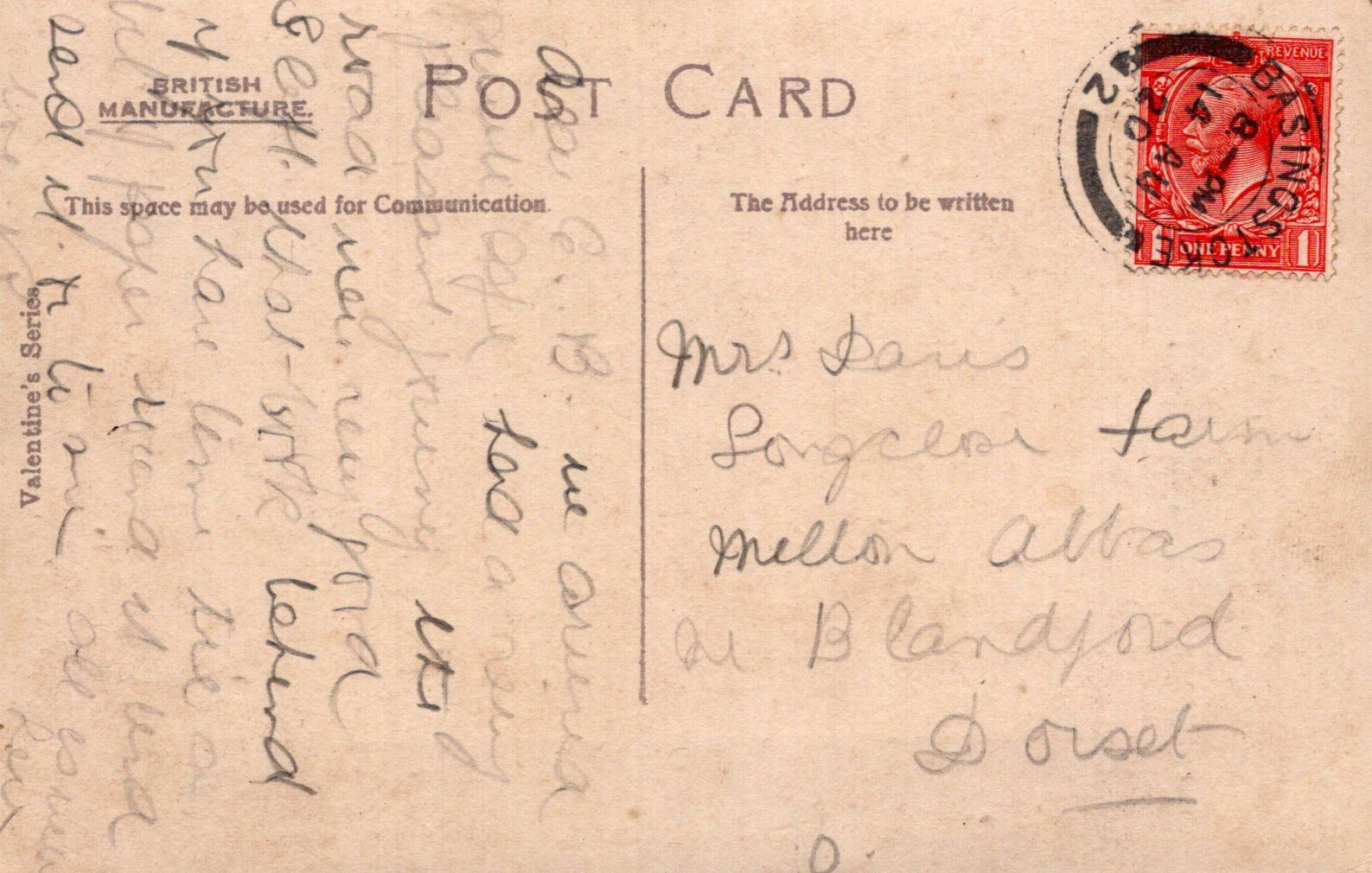 Vintage postcard with handwritten text and a red stamp on a beige background