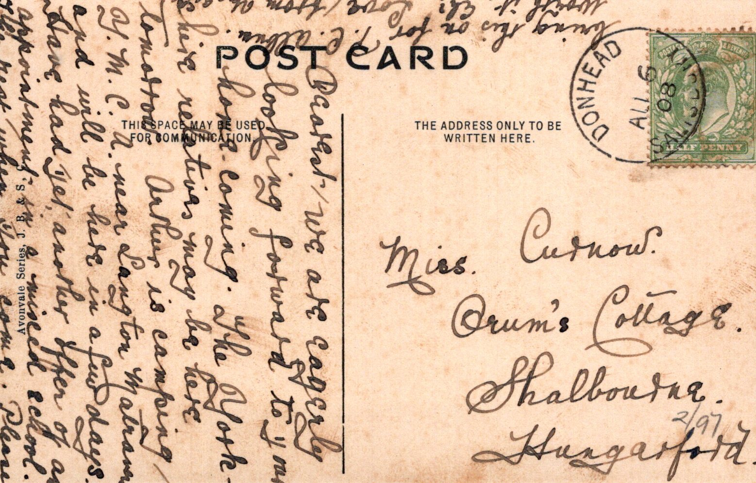 Vintage postcard with text and postage stamp