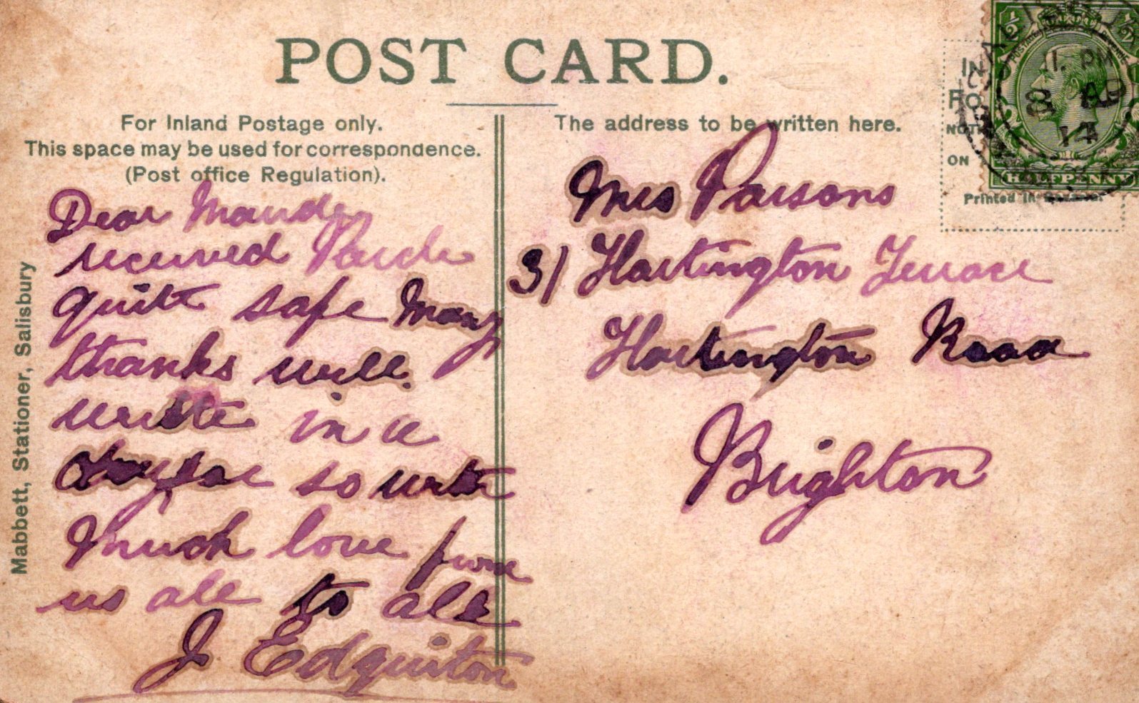Vintage postcard with handwritten text and a stamp, featuring a brown background.