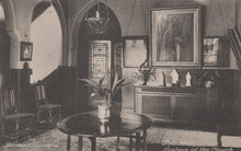 Load image into Gallery viewer, Vintage interior scene of a room with furniture and decorative elements.
