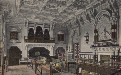 Decorative interior of a building with ornate architecture and furniture.