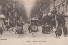 Load image into Gallery viewer, Vintage street scene in Nice with early automobiles and tram tracks
