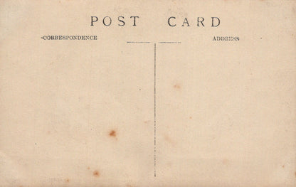 Vintage postcard with 'Correspondence Address' text on a beige background