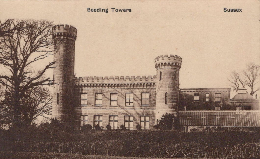 Vintage black and white photograph of a castle-like building with towers labeled 'Beeding Towers, Sussex'.