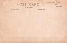 Load image into Gallery viewer, Vintage postcard with typewritten text on a beige background
