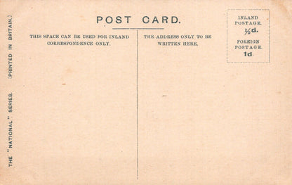 Back of a vintage postcard with printed text and stamps.