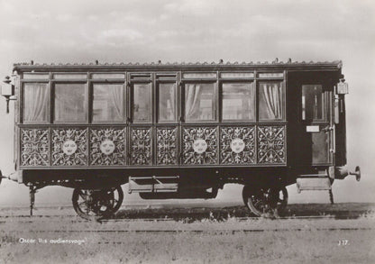 Vintage ornate vehicle on a plain background
