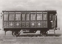 Load image into Gallery viewer, Vintage ornate vehicle on a plain background
