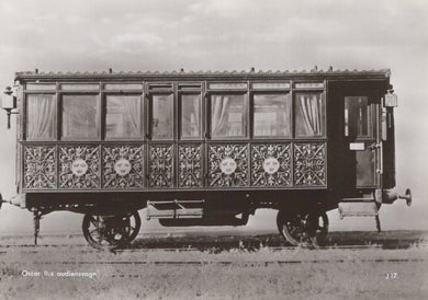 Vintage ornate vehicle on a plain background