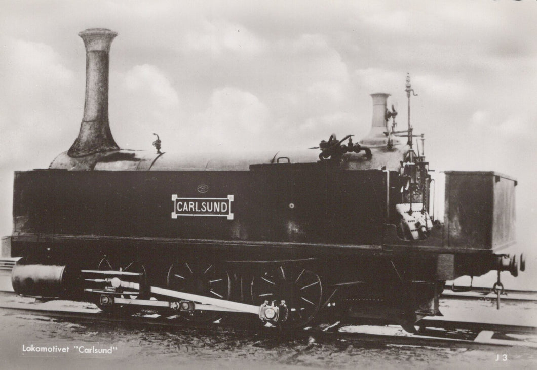 Black and white image of a steam locomotive with 'Carlsund' branding.