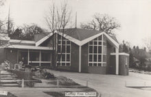 Load image into Gallery viewer, Black and white photograph of a modern church building with &#39;Cuffley Free Church&#39; sign.
