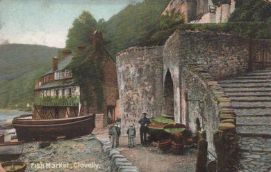 Vintage postcard of a coastal scene with a boat, building, and people near a stone wall.