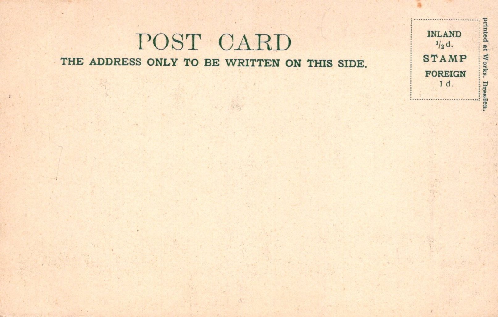 Vintage postcard back with text and stamp information