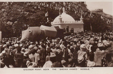 Vintage black and white photograph of a large crowd gathered around a mosque at Steamer Point, Aden.