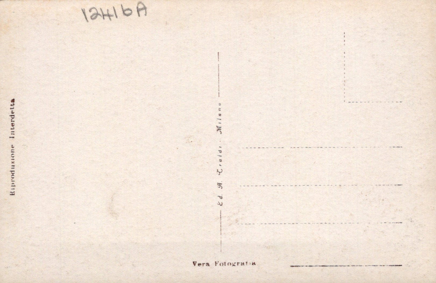 Back of a vintage postcard with printed text and lines for writing.