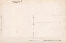 Load image into Gallery viewer, Back of a vintage postcard with printed text and lines for writing.
