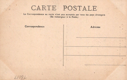 Vintage French postcard with text and address fields on a beige background
