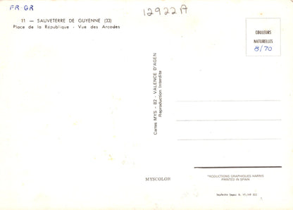 Back of a postcard with text and numbers on a white background