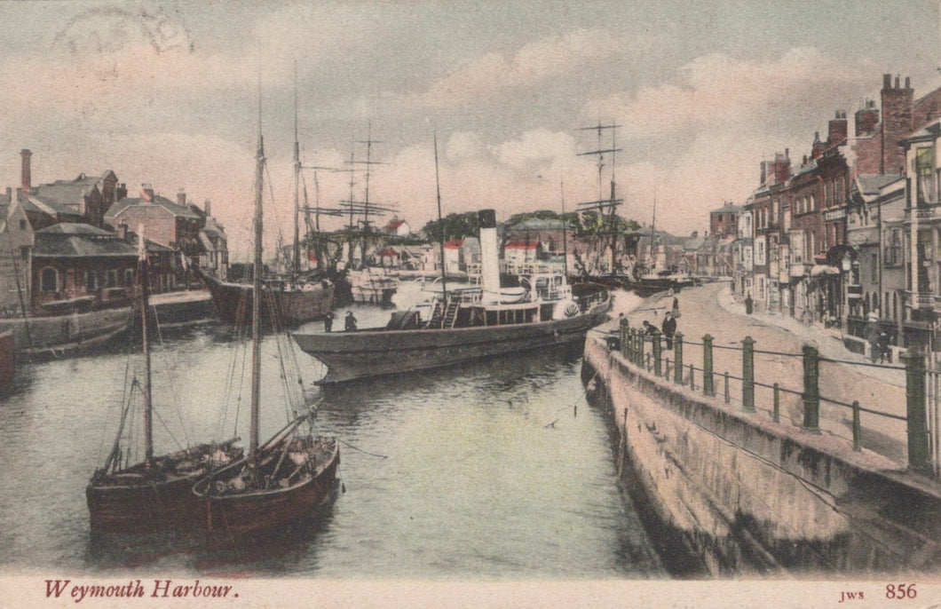 Vintage postcard of Weymouth Harbour with ships and buildings.