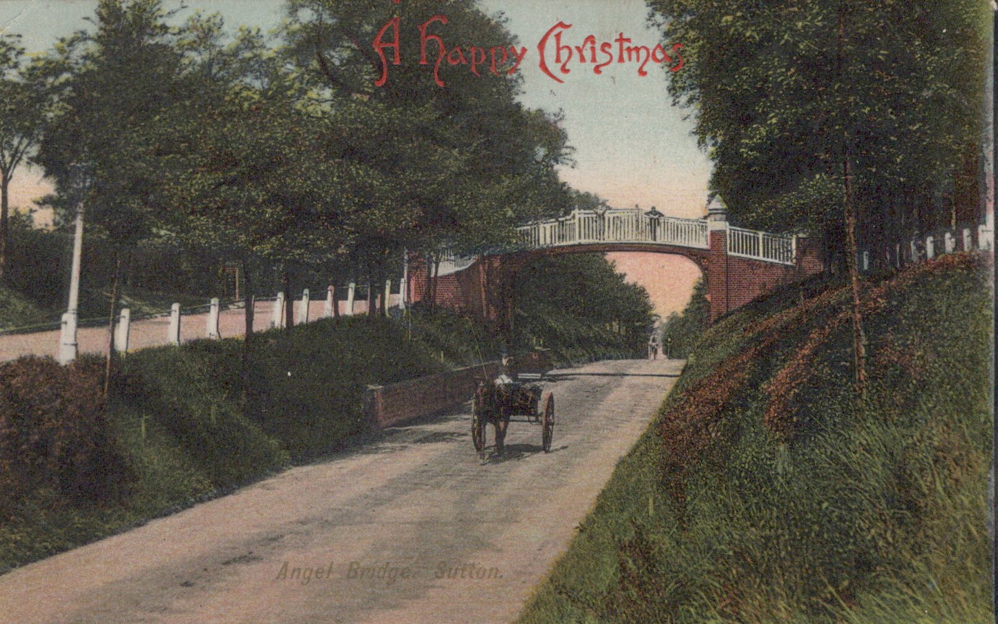 Vintage Christmas card with a car on a road, trees, and a bridge.