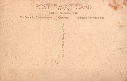 Vintage postcard with text and a textured background